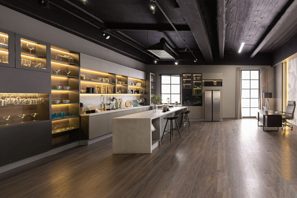 Laminate floors in High-Style, Low-Effort, Low-Maintenance Flooring in a large kitchen by Hadingers in Fort Myers Florida