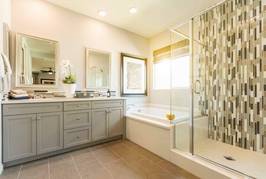 Tile floors and shower in a luxury bathroom by Hadingers in Fort Myers Florida